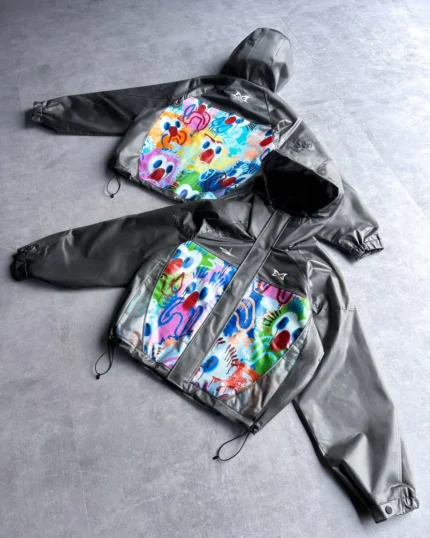 A Mertra Translucent Jacket is where contemporary streetwear meets artistic expression. Designed for those who move boldly, this jacket features a lightweight translucent construction that delivers both style and functionality. The unique design reflects the creative energy of Mertra, blending modern aesthetics with an urban edge that stands out effortlessly. Whether layered over casual fits or styled as a statement piece, the A Mertra Translucent Jacket offers versatility without compromising attitude. Crafted with precision and purpose, the A Mertra Translucent Jacket embodies innovation and individuality. Its sleek silhouette, combined with artistic detailing inspired by Mertra X Slawn, makes it a must-have for trendsetters who value originality. Perfect for transitional weather, this jacket balances breathability and protection while elevating your everyday look with a bold, fashion-forward identity. Product Details Lightweight translucent fabric for a modern streetwear look Premium construction with durable finishing Artistic design inspired by Mertra Adjustable hood and cuffs for a customizable fit Ideal for layering and all-season styling